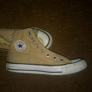 Sandy colored Converse